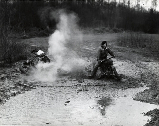 Vintage Harley-Davidson motorcycles in the mud