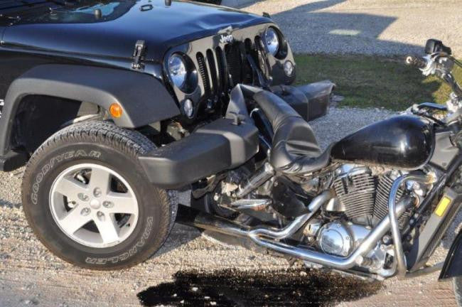 DUI Suspects Hits Motorcyclist and Continues Home with Bike Stuck To Front Bumper