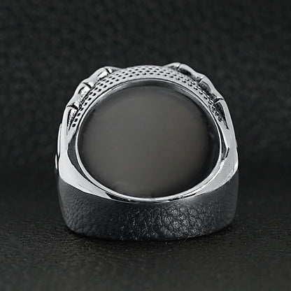Stainless Steel Skeleton Hands Holding Blue Eyeball Ring